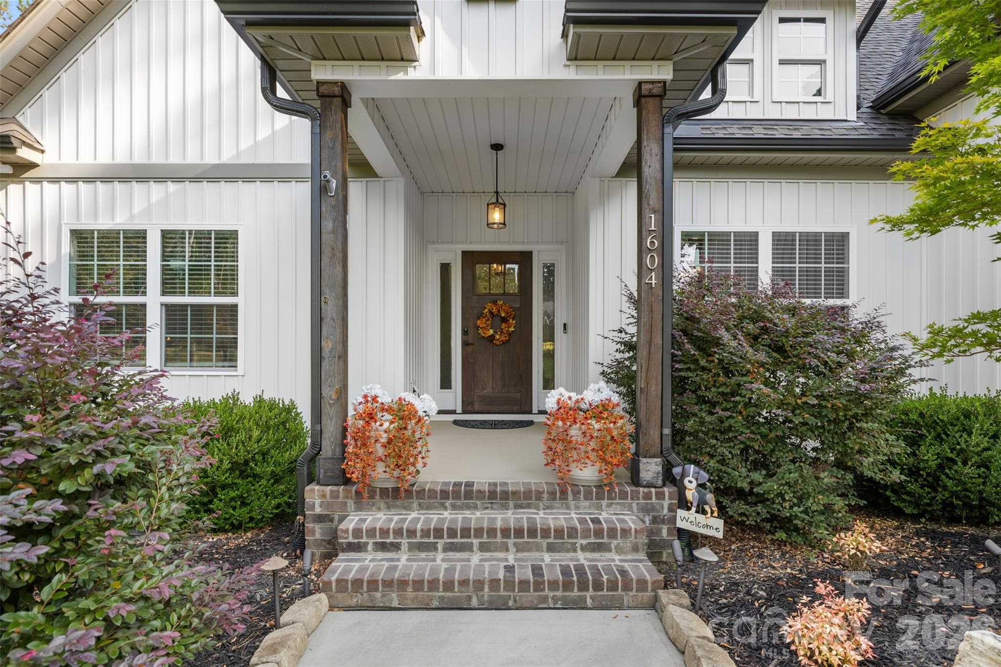 A warm and welcoming covered entry - 1604 Aragon Beach Road, Rock Hill