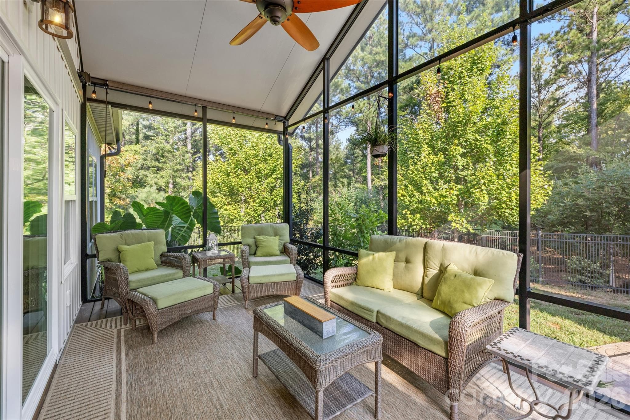 Expansive screened porch surrounded by peaceful wooded views - 1604 Aragon Beach Road, Rock Hill