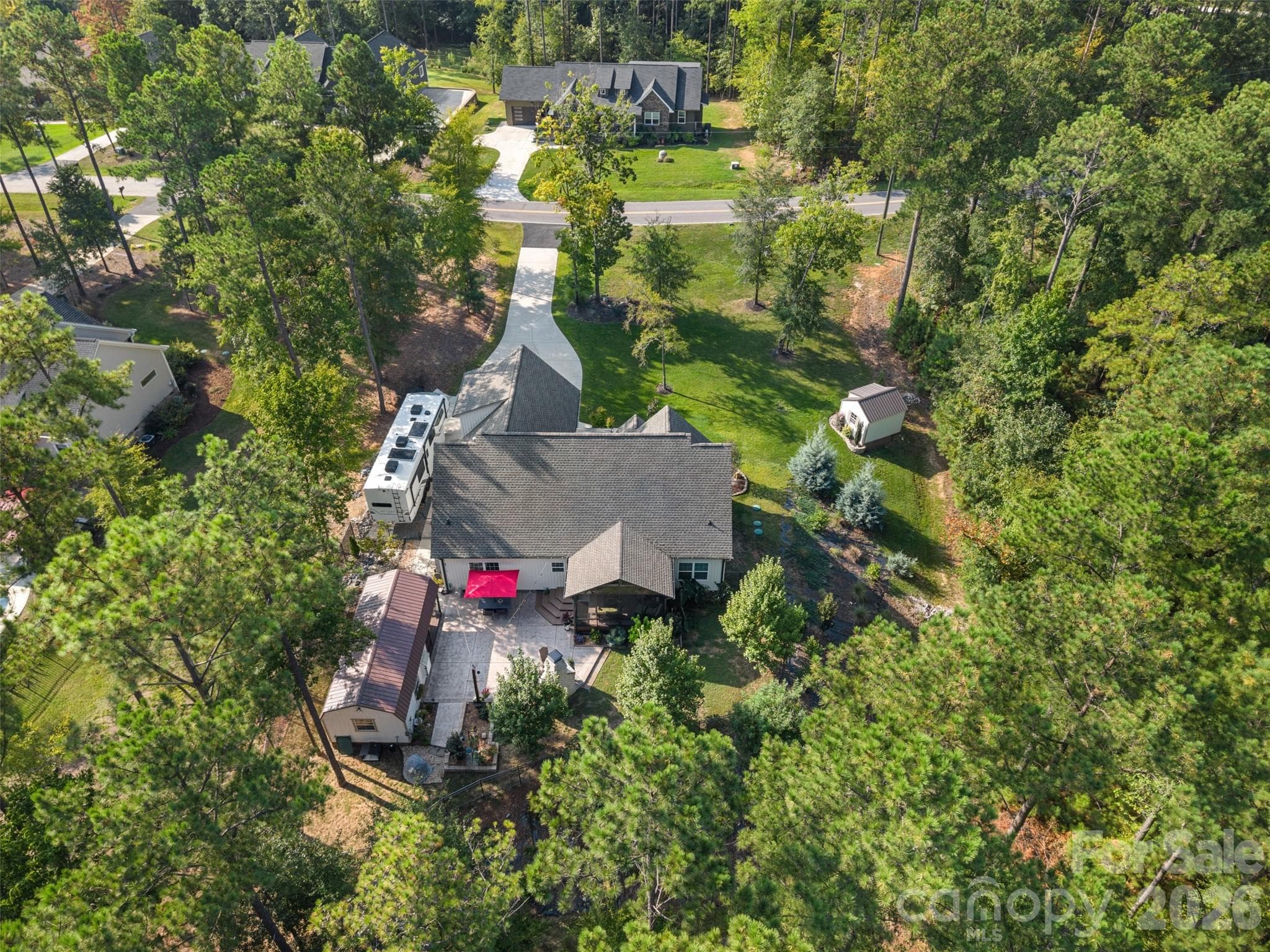 Generous homesite offers privacy, mature trees, and multiple outdoor living spaces - 1604 Aragon Beach Road, Rock Hill