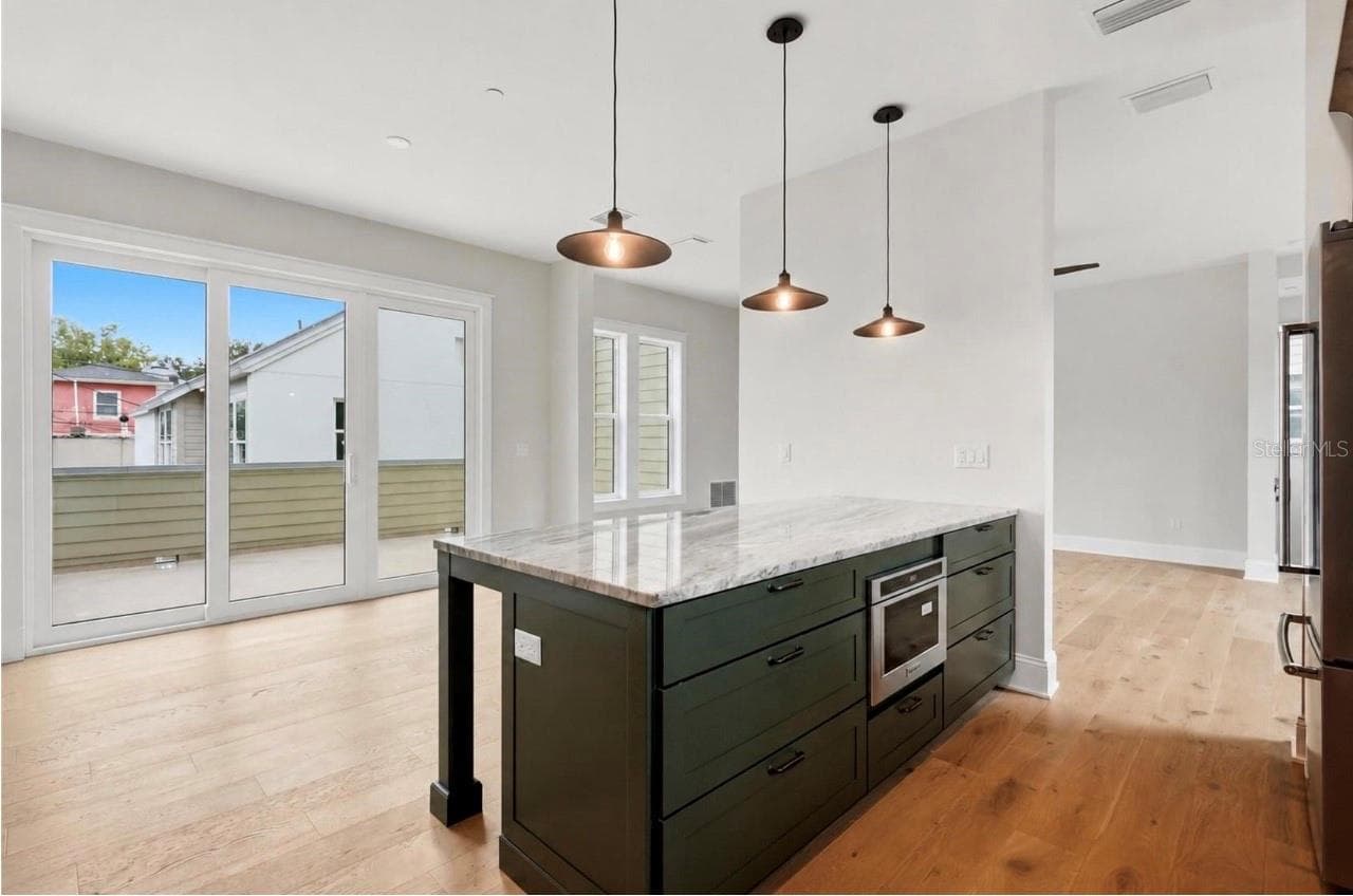 2nd Floor Living Room and Kitchen with Balcony - 2532 1ST AVE N, ST PETERSBURG