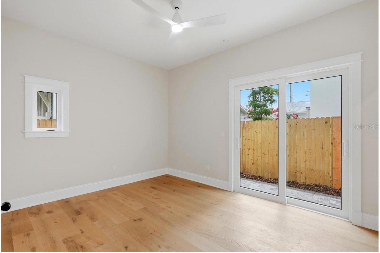 First Floor Bedroom with Ensuite and Sliding Doors to Patio - 2532 1ST AVE N, ST PETERSBURG