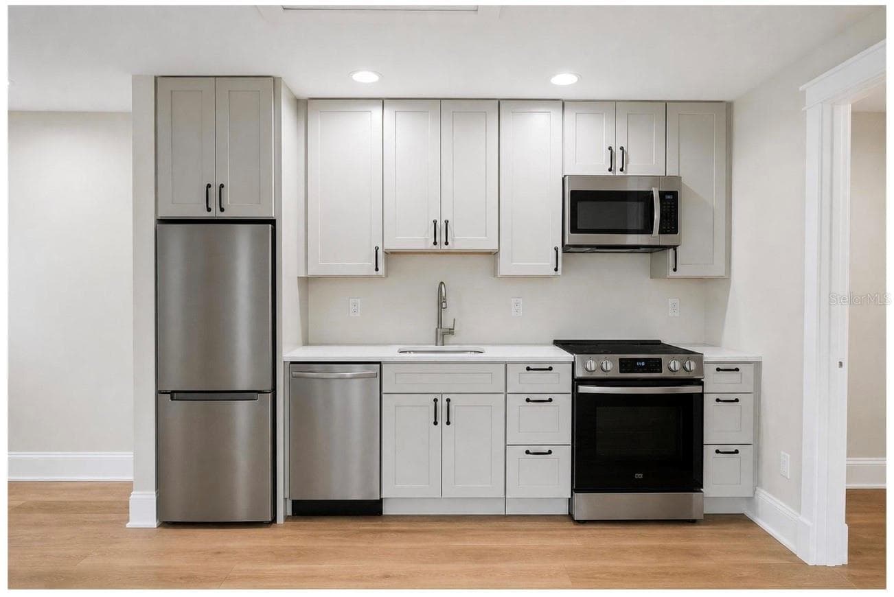 ADU 377 sq ft Studio with Walk in Closet, W/D hookup and Full Bathroom AI Image with Appliances Added - 2532 1ST AVE N, ST PETERSBURG