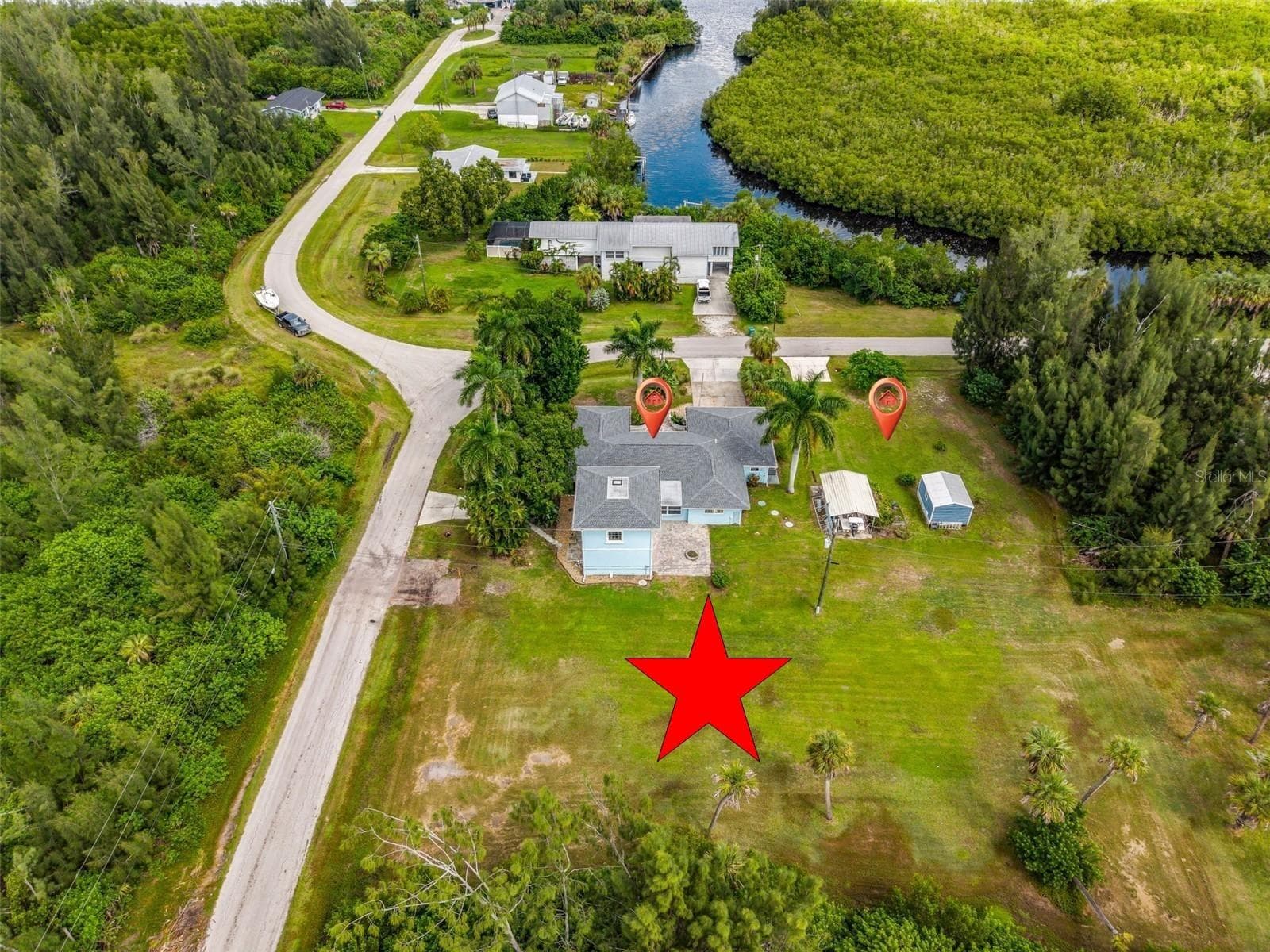 Aerial property view with home and back yard - 3407 ISLAND VIEW DR, PUNTA GORDA