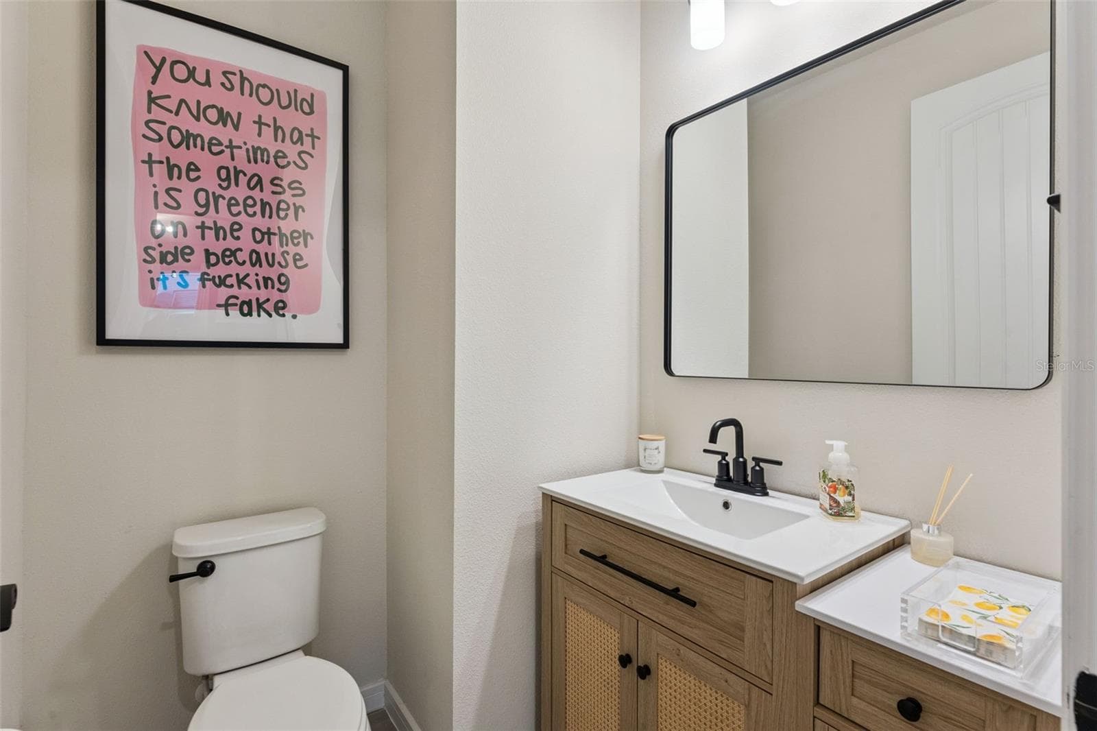 Half bathroom downstairs - 5664 OAK KNOLL DR, ST CLOUD