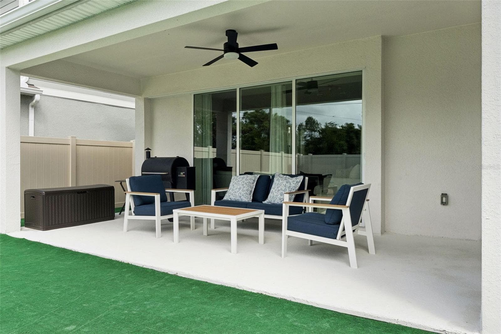 Rear patio - 5664 OAK KNOLL DR, ST CLOUD