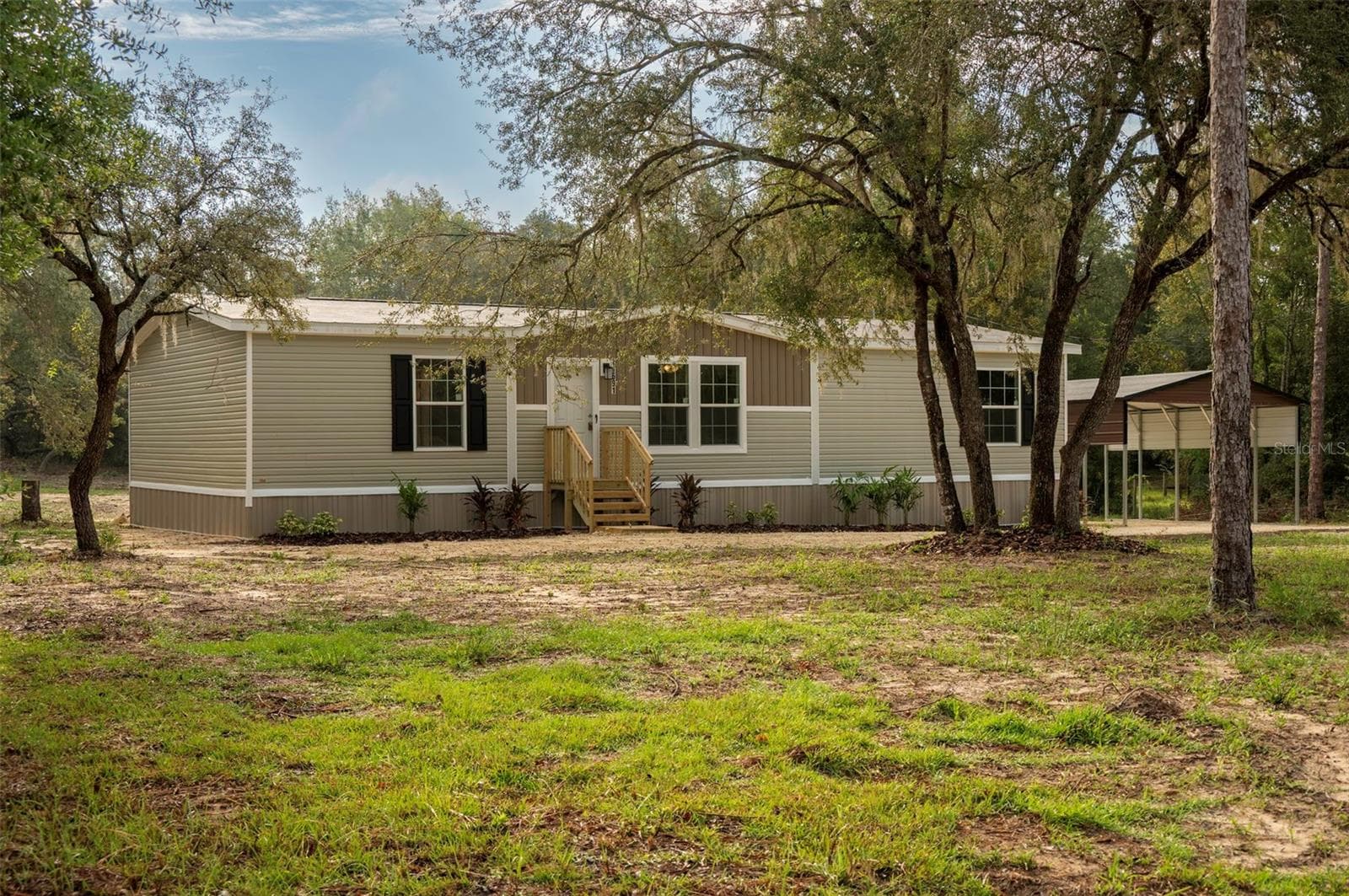 Manufactured Home at 11691 NE 106TH CT, ARCHER, photo 5 of 39