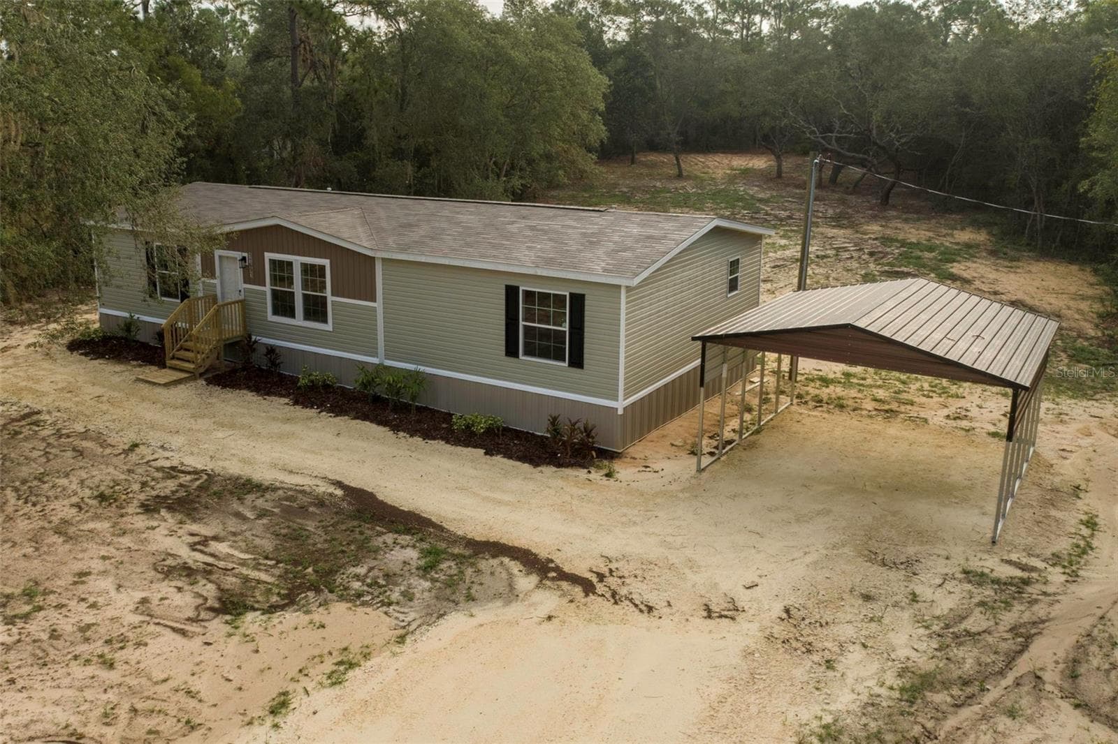 Manufactured Home at 11691 NE 106TH CT, ARCHER, photo 7 of 39