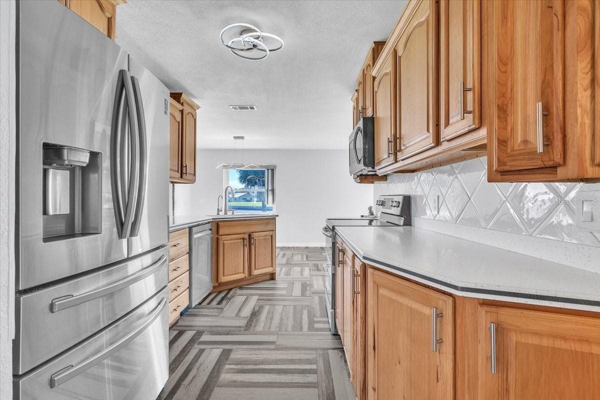 Single Family Residence at 795 S ELLICOTT CIR, PORT CHARLOTTE, photo 10 of 86