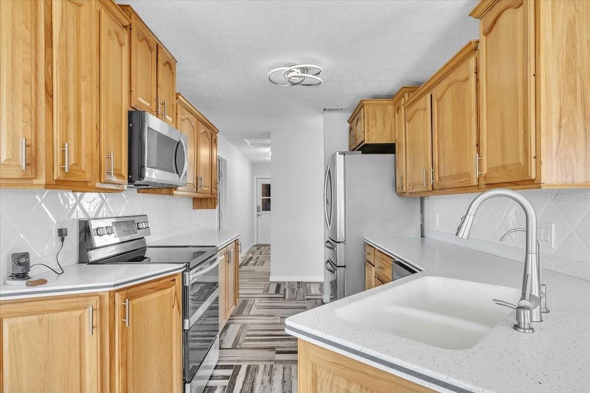 Single Family Residence at 795 S ELLICOTT CIR, PORT CHARLOTTE, photo 14 of 86