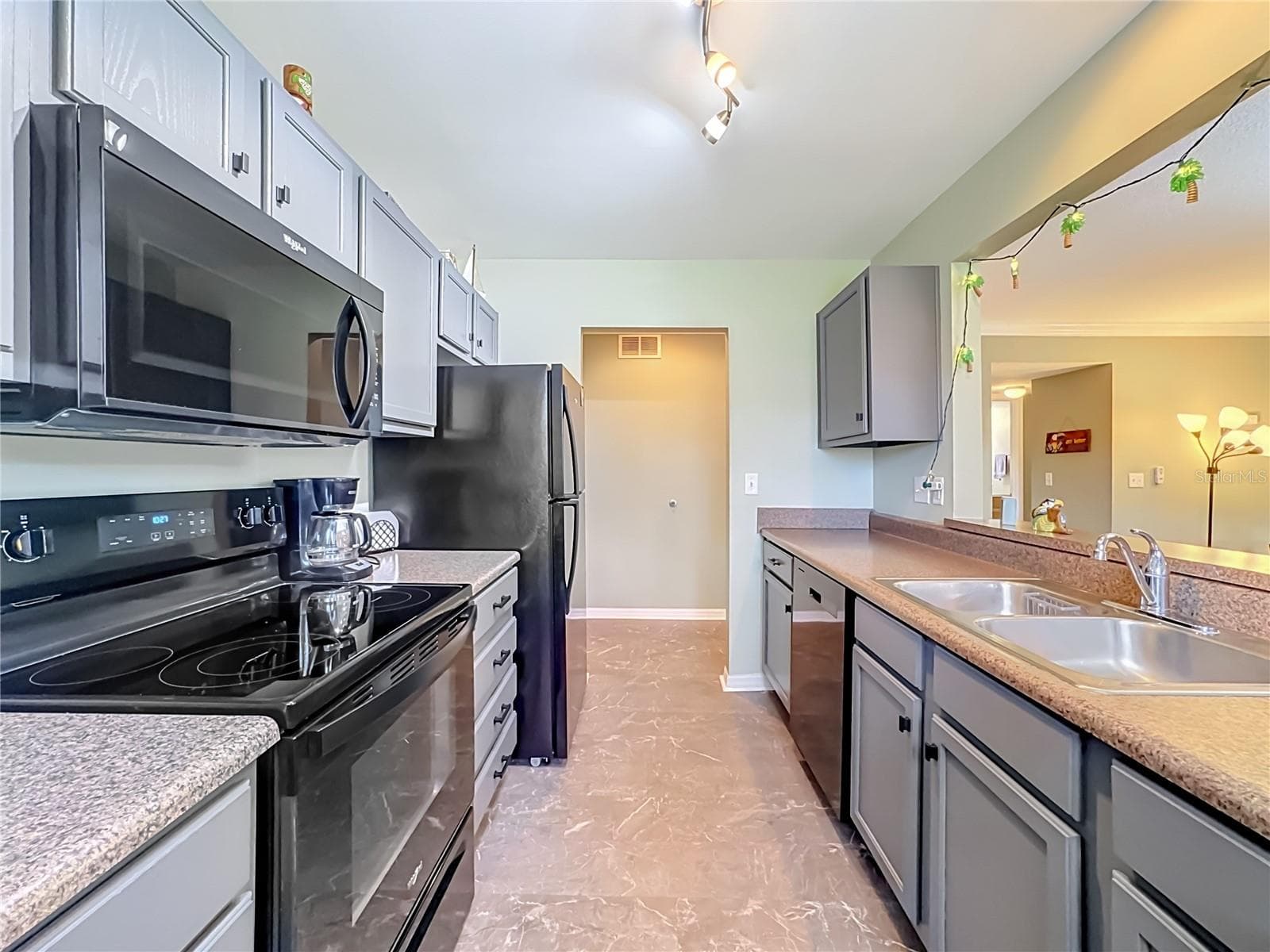 updated cabinets and flooring - 1935 TOUCAN WAY #302, SARASOTA