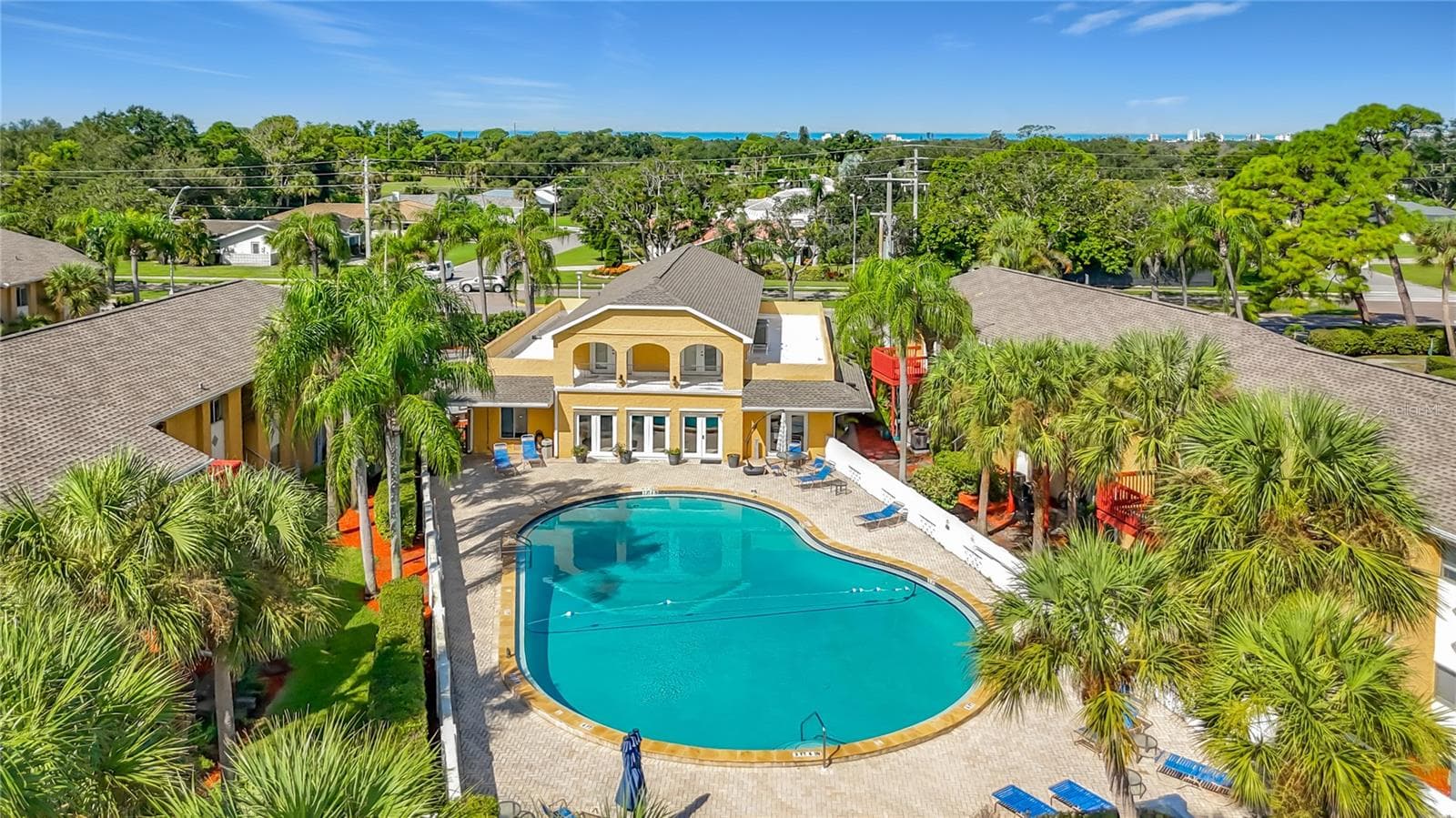 pool and clubhouse with fitness facility - 1935 TOUCAN WAY #302, SARASOTA