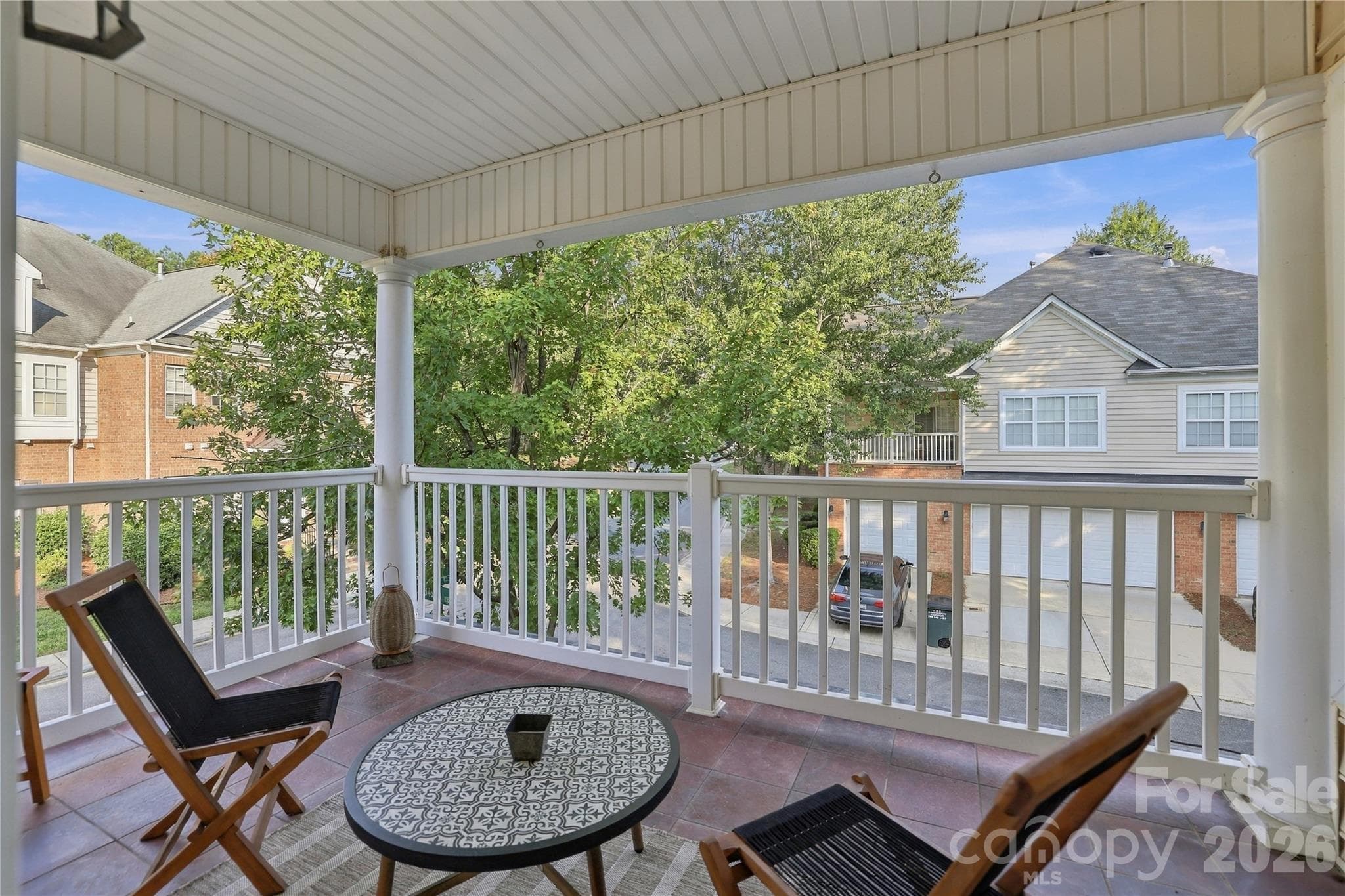 Covered balcony for peacedul morning coffee or evening relaxation - 15329 Jade Street, Charlotte