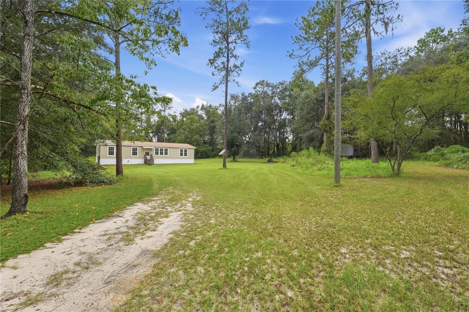 Manufactured Home at 5685 SW 57TH DR, LAKE BUTLER, photo 2 of 30