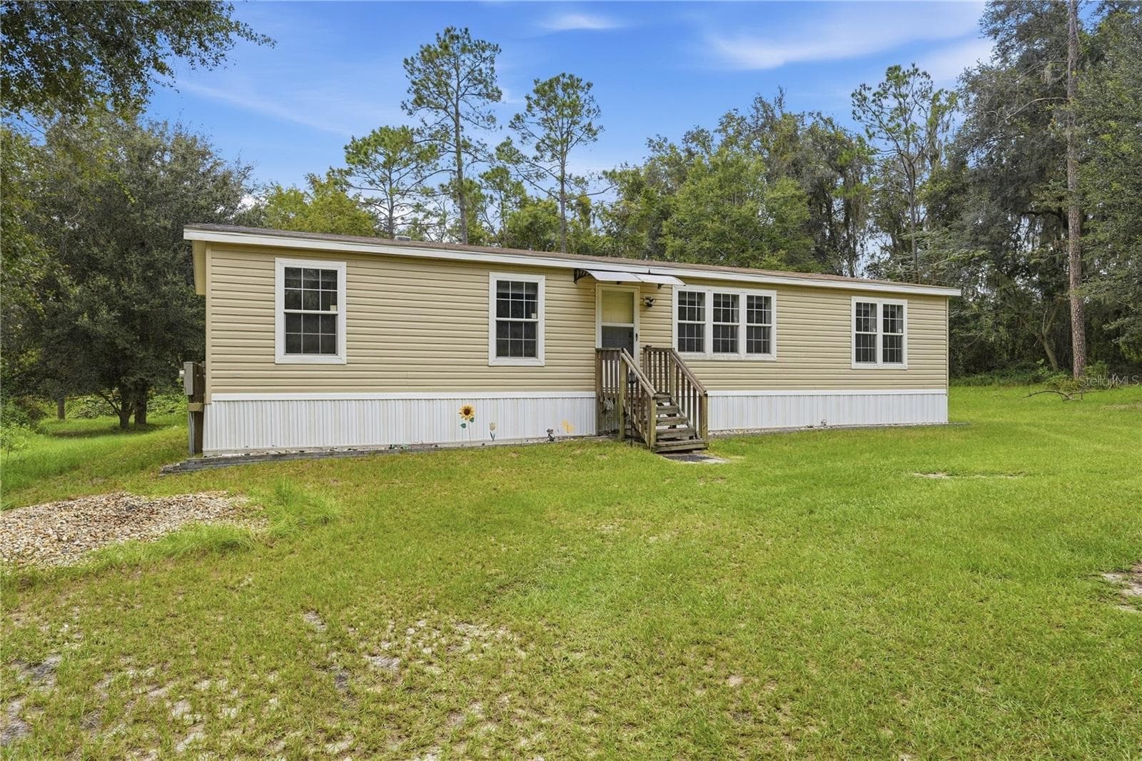 Manufactured Home at 5685 SW 57TH DR, LAKE BUTLER, photo 3 of 30