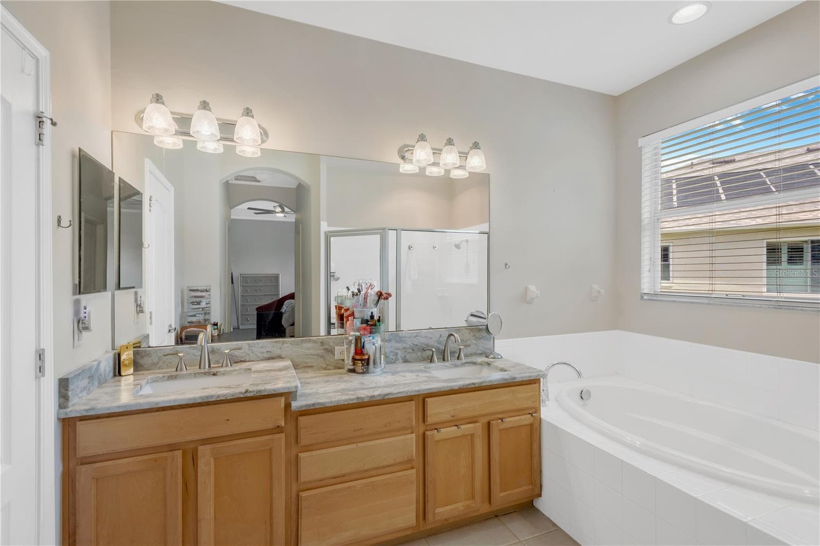 Double sink, garden tub, private water closet and shower in Primary Bathroom - 31230 ALCHESTER DR, WESLEY CHAPEL