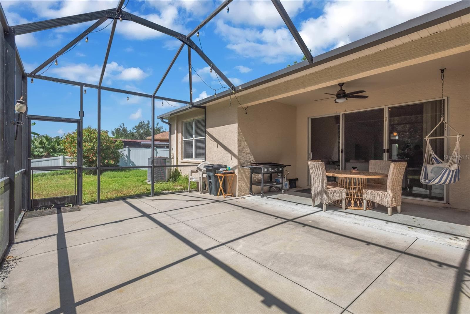 Screened in Patio in Backyard - 31230 ALCHESTER DR, WESLEY CHAPEL