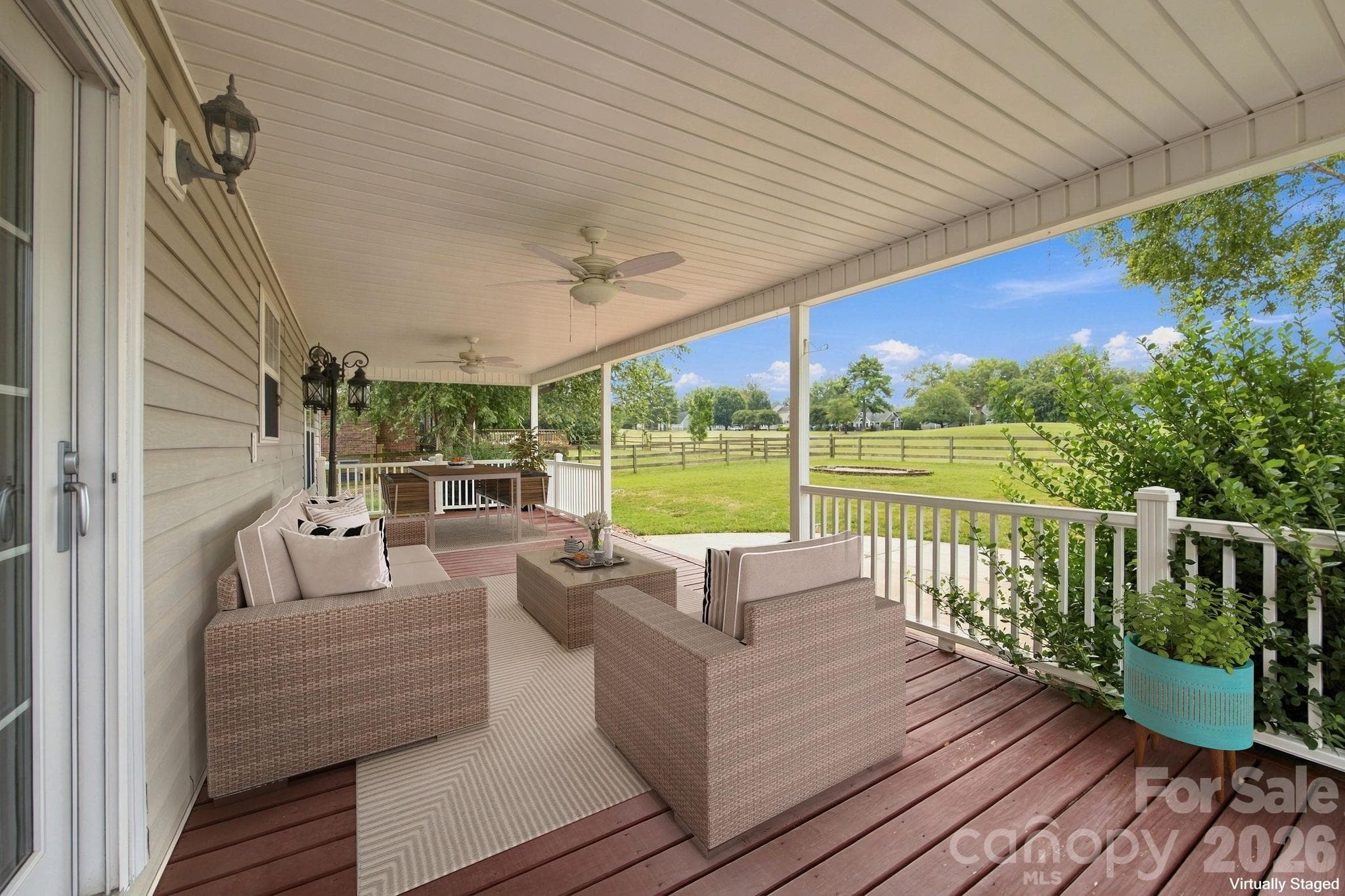 Virtually staged to showcase the spacious covered porch and golf course views. - 122 Wood Duck Loop, Mooresville