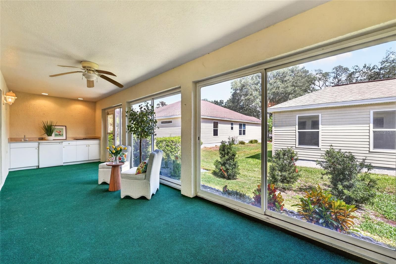 Outdoor kitchen in the lanai - 17101 SE 94TH BERRIEN CT, THE VILLAGES