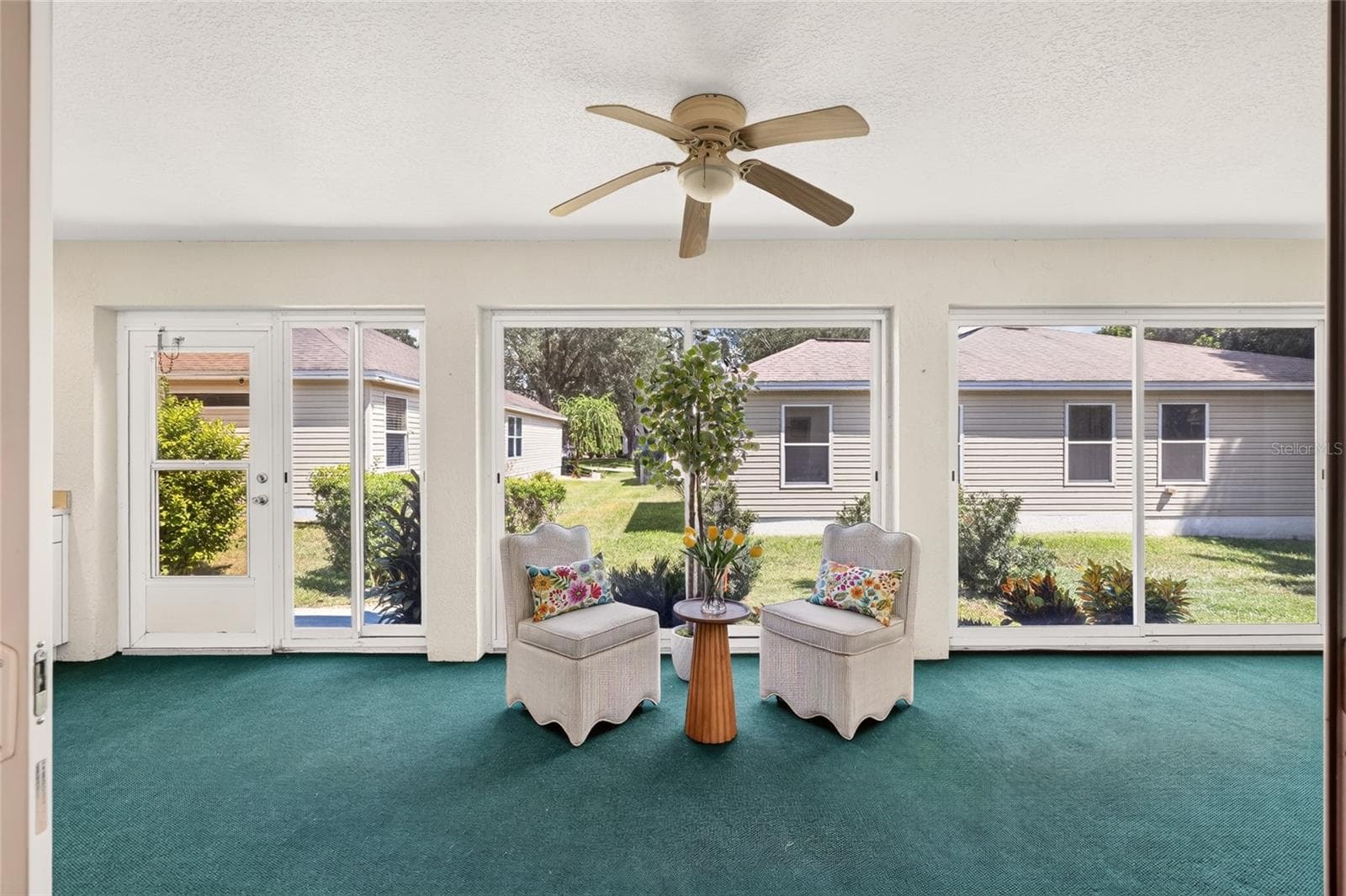 Glass Enclosed Lanai, could easily add a mini split to make it all season. - 17101 SE 94TH BERRIEN CT, THE VILLAGES