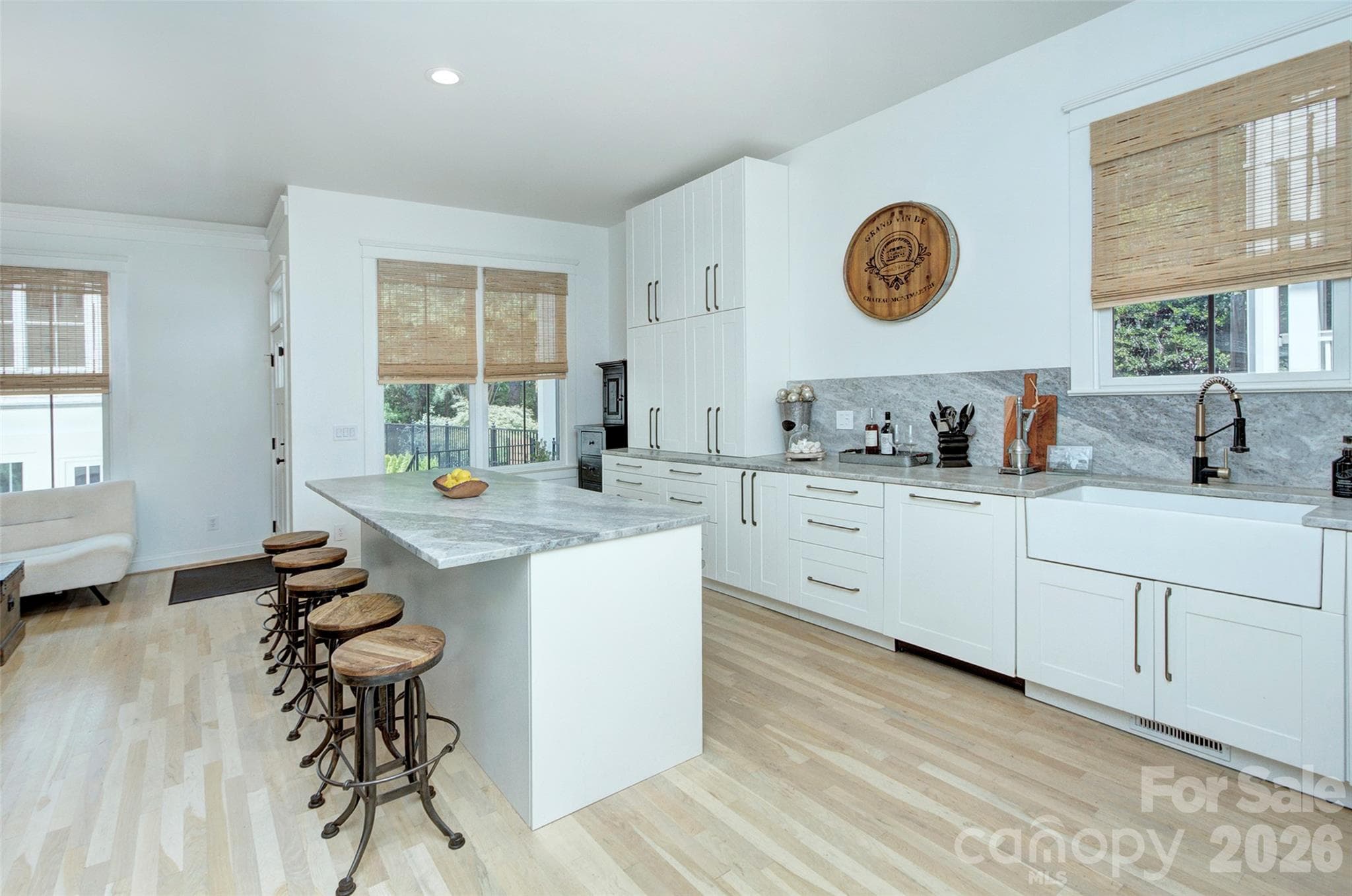 8 foot island has seating for 5 and storage - 2561 Lower Assembly Drive, Fort Mill