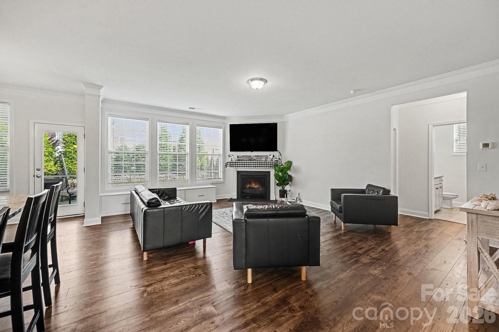 Large Family Room with built-in storage and lots of natural light - 5710 Rainbow Lane, Indian Land