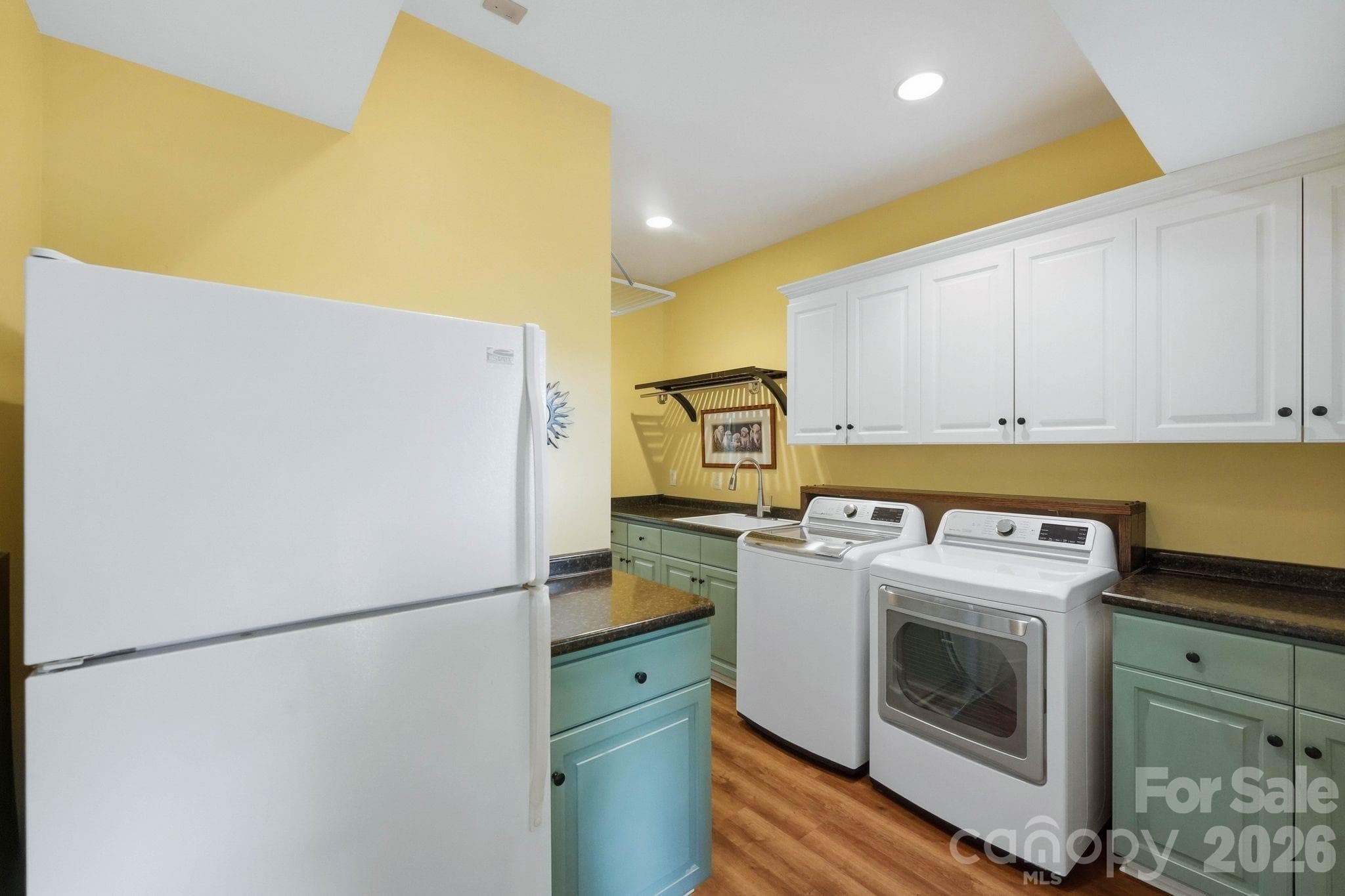 Lower level kitchen/laundry - 6719 Seton House Lane, Charlotte