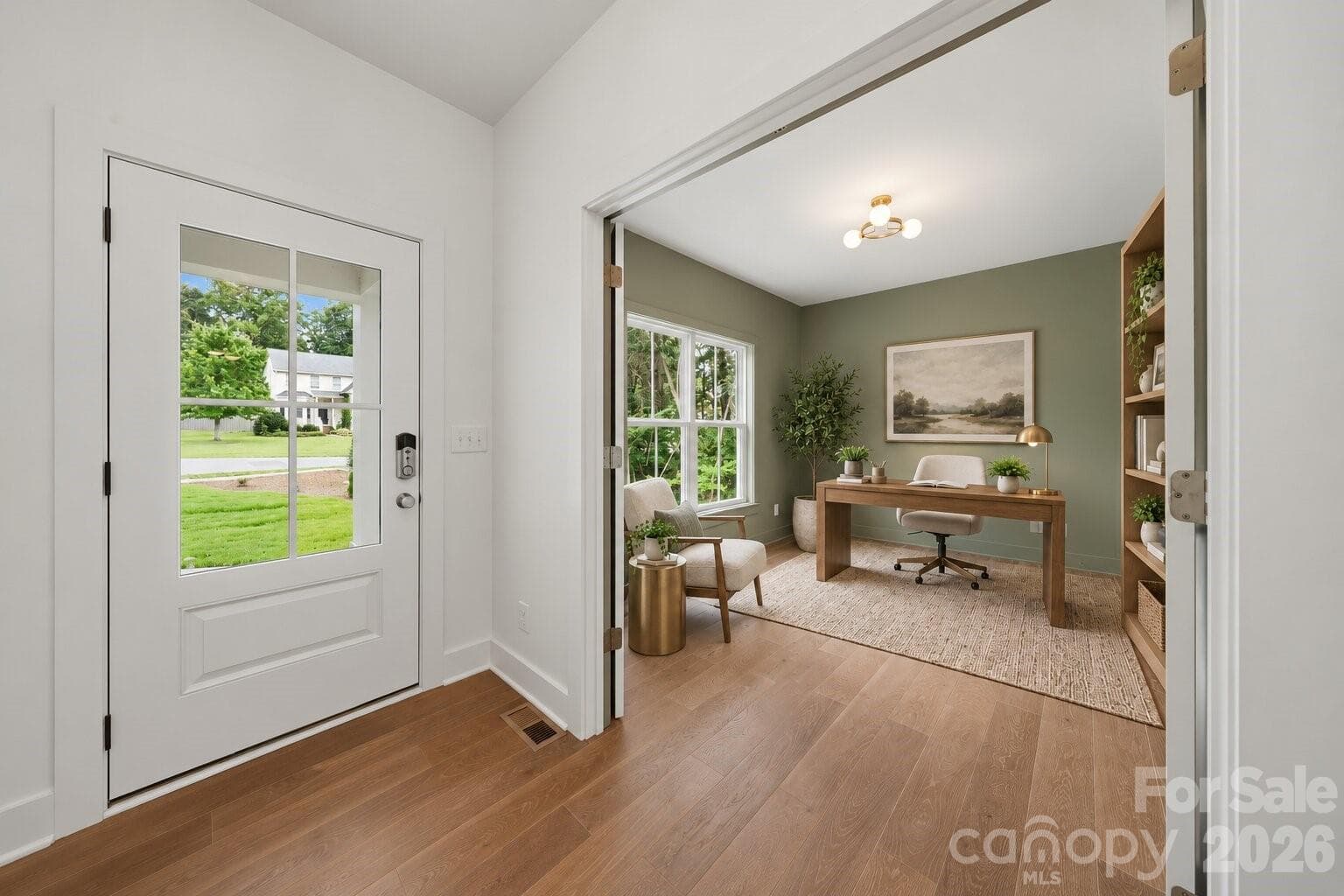 Foyer and home office (image contains AI-generated virtual staging). - 2311 Chateau Court, Matthews