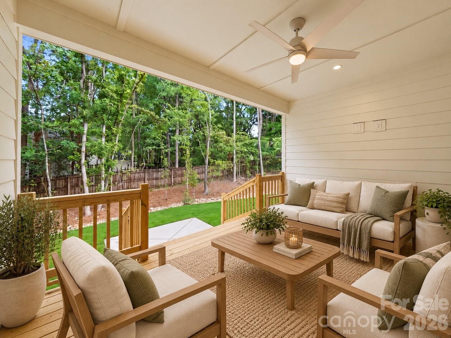 Covered porch (image contains AI-generated virtual staging). - 2311 Chateau Court, Matthews
