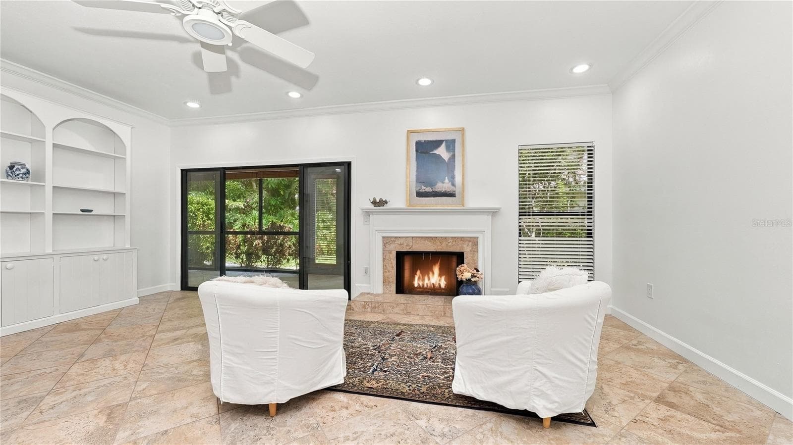 Living Room and Wood Burning Fireplace - 4802 KESTRAL PARK CIR #22, SARASOTA