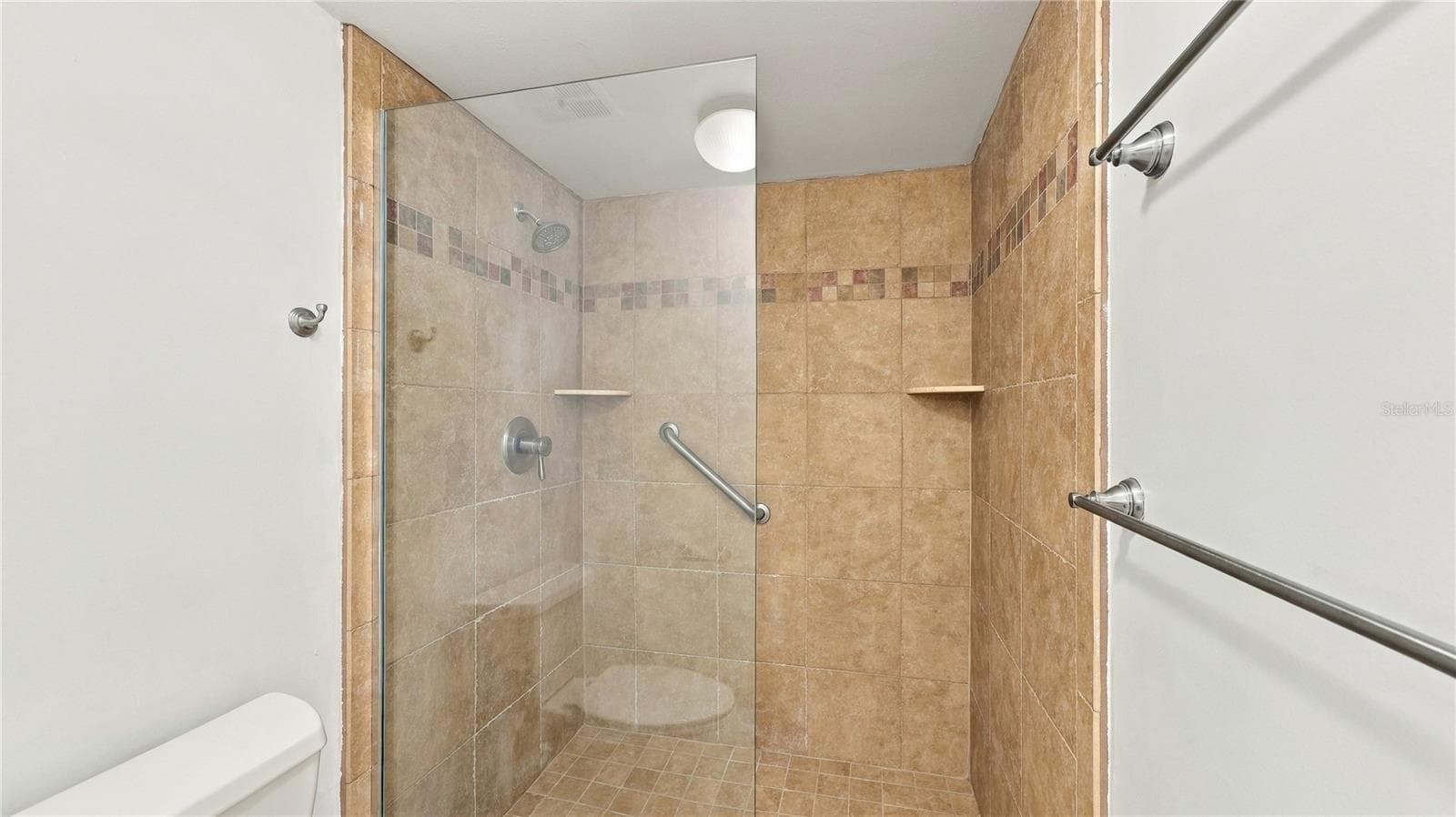 Primary Shower with walk in and Glass Wall - 4802 KESTRAL PARK CIR #22, SARASOTA