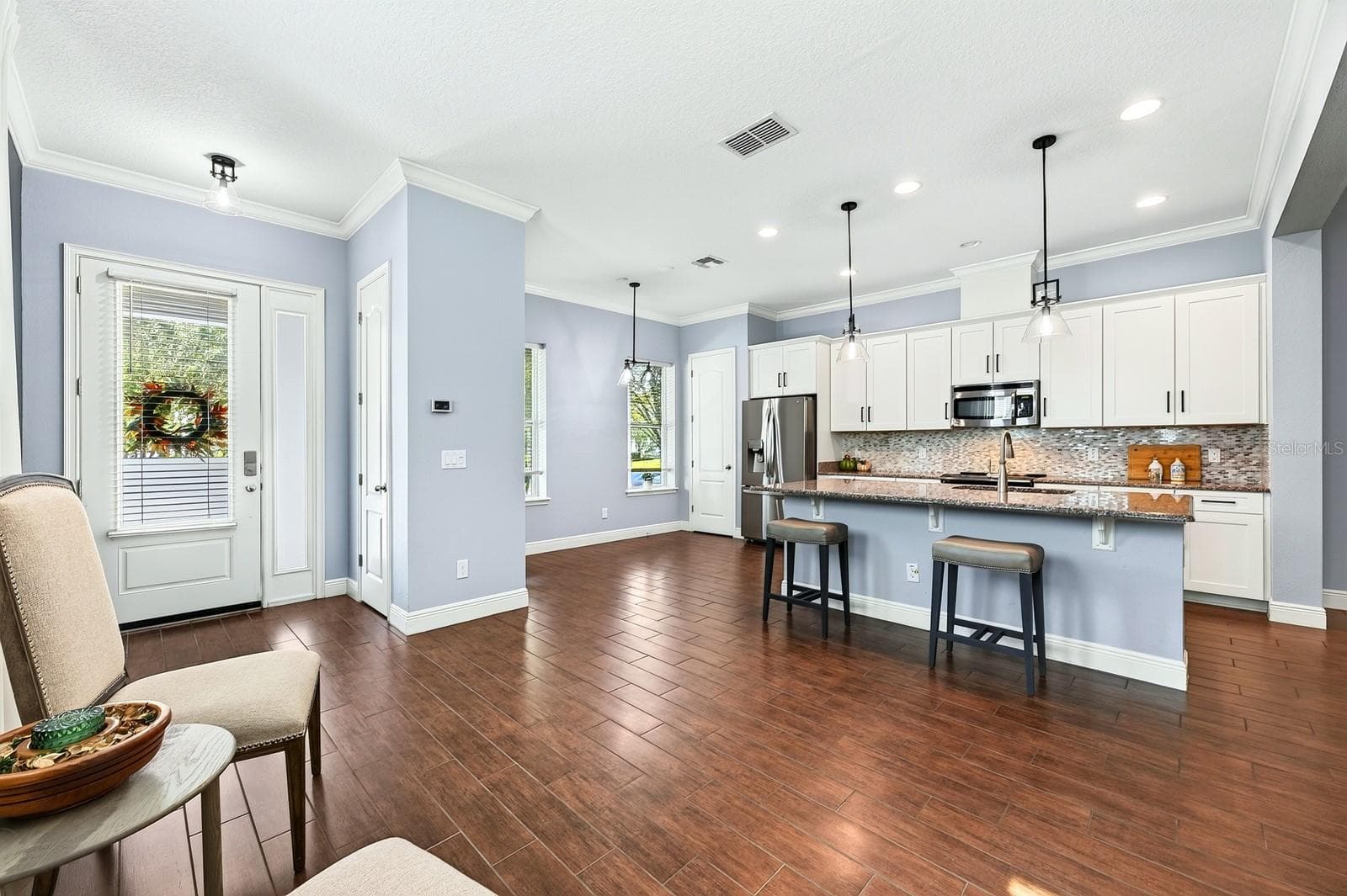 Kitchen is open to flexible dining spaces. - 14061 WALCOTT AVE, ORLANDO