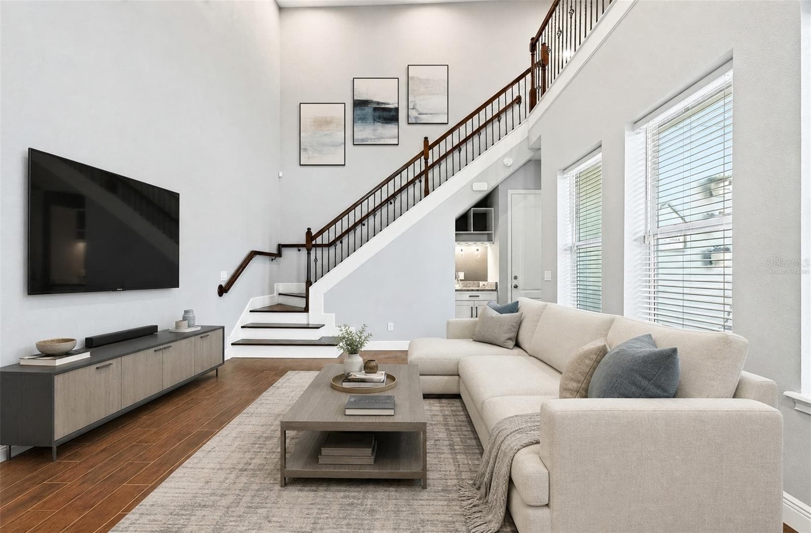 Light and bright two story living room. Virtually Staged. - 14061 WALCOTT AVE, ORLANDO