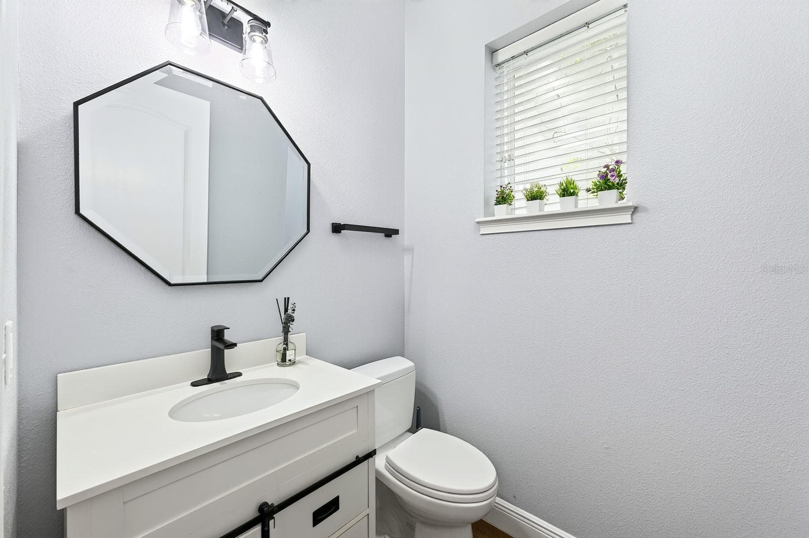 Main floor powder room. - 14061 WALCOTT AVE, ORLANDO