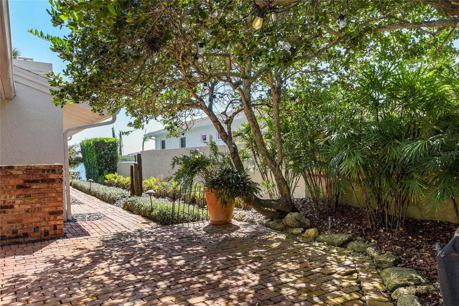 Kitchen, Dining Room and Office all open onto Courtyard - 1215 COMMODORE DR, NEW SMYRNA BEACH