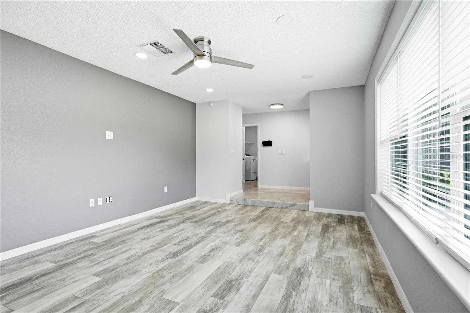 Unstaged Sunken Living Room - 8345 APPLE ORCHARD RD, SPRING HILL