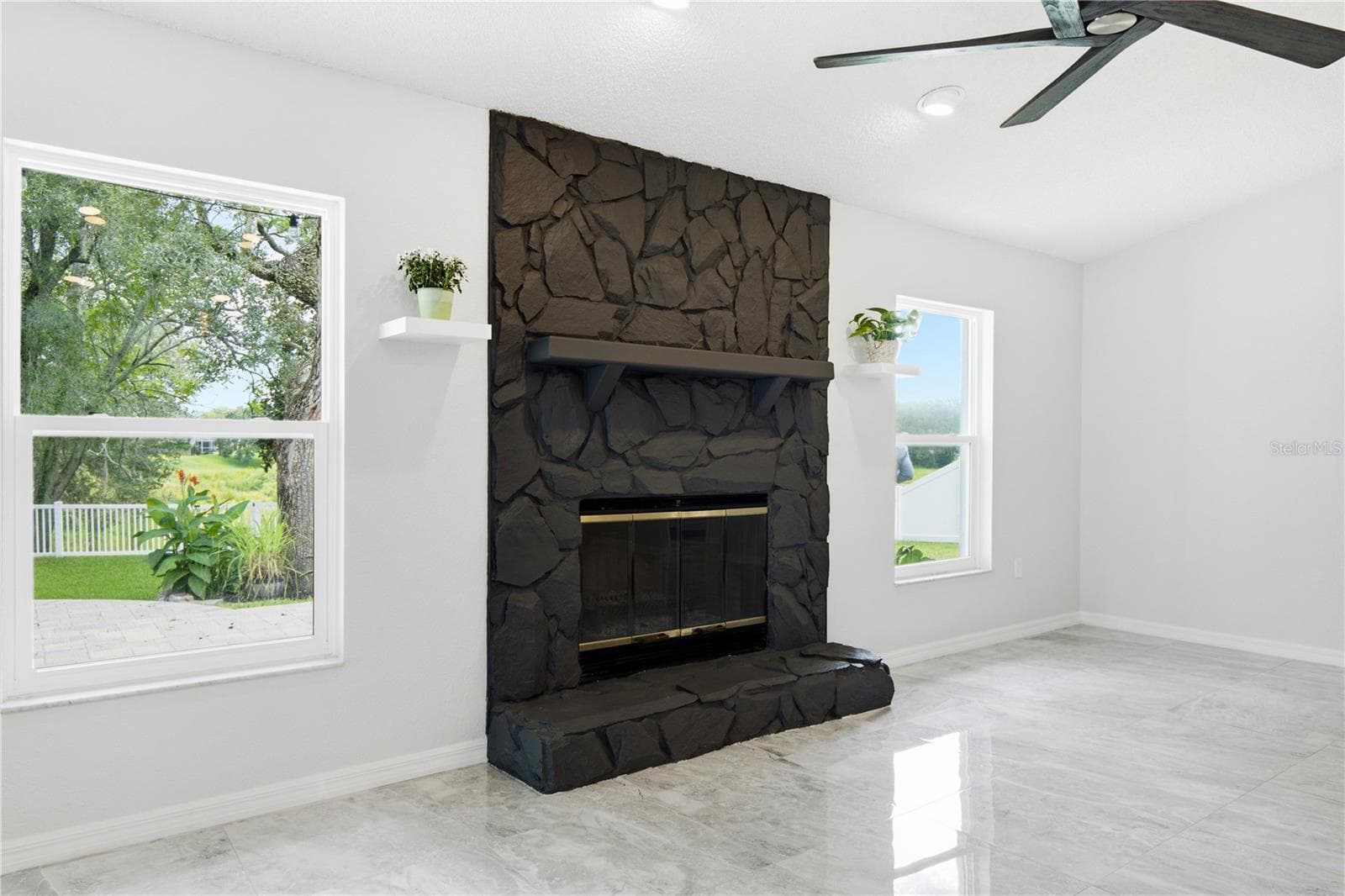 Unstaged Fireplace Seating - 8345 APPLE ORCHARD RD, SPRING HILL