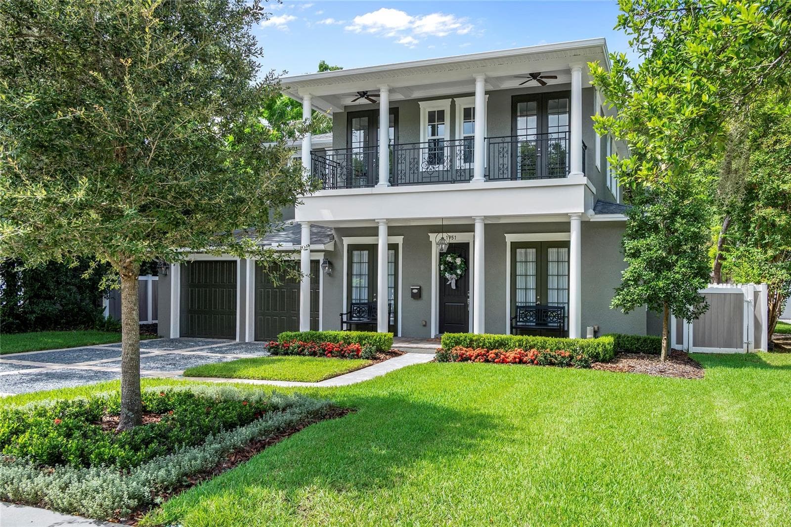 Crisp landscaping sets off the classic architecture. - 1951 WINTER PARK RD, WINTER PARK