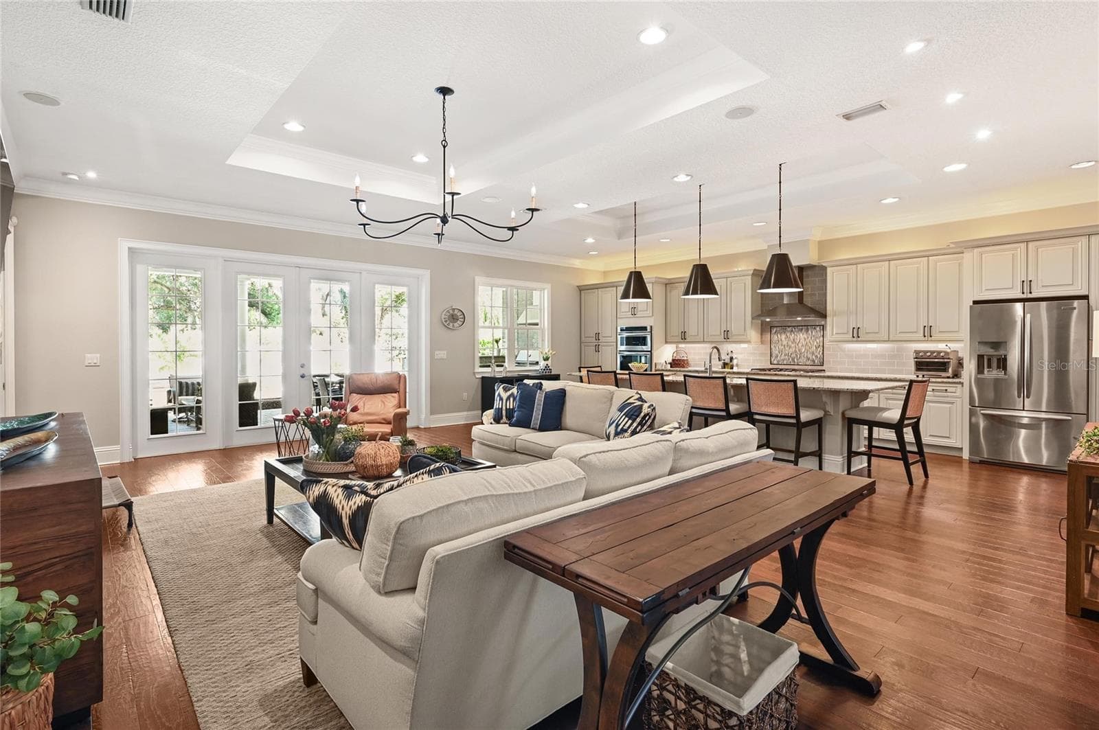The large chef kitchen overlooks a generous family room, creating the perfect space for family and friends to gather. - 1951 WINTER PARK RD, WINTER PARK