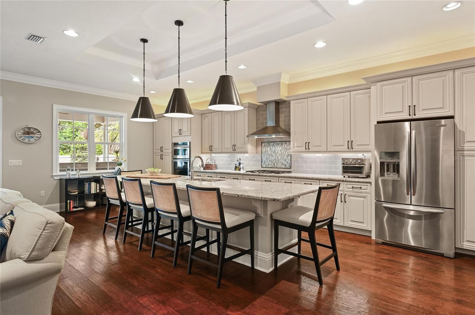 The center piece, an oversized granite island, makes this kitchen ideal for cooking, entertaining, as well as quick, casual meals. - 1951 WINTER PARK RD, WINTER PARK