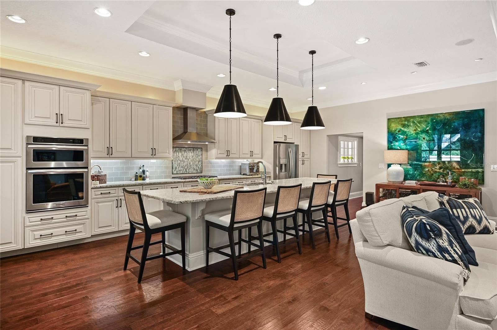 The stainless steel KitchenAid appliance package includes a gas cooktop and hood. - 1951 WINTER PARK RD, WINTER PARK