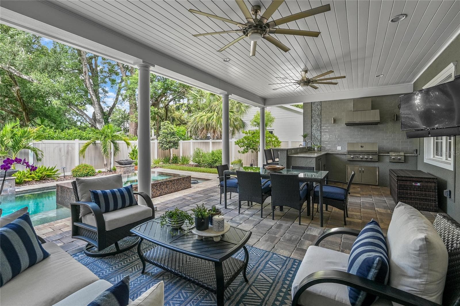 Ultimately, this outdoor living area is the favorite hub for enjoying Winter Park life under the tree canopy. - 1951 WINTER PARK RD, WINTER PARK