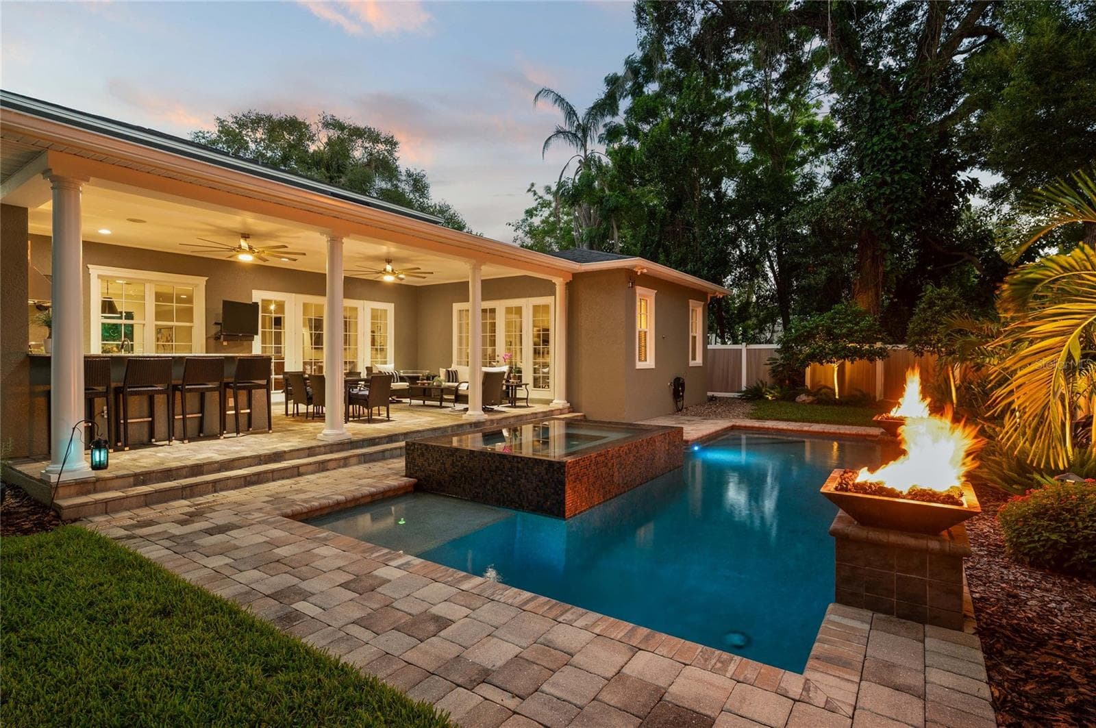 Sunsets peek through the canopy of trees in the evening, beckoning you to take a stroll down to Lake Sue through Charmont's quiet, brick streets. - 1951 WINTER PARK RD, WINTER PARK