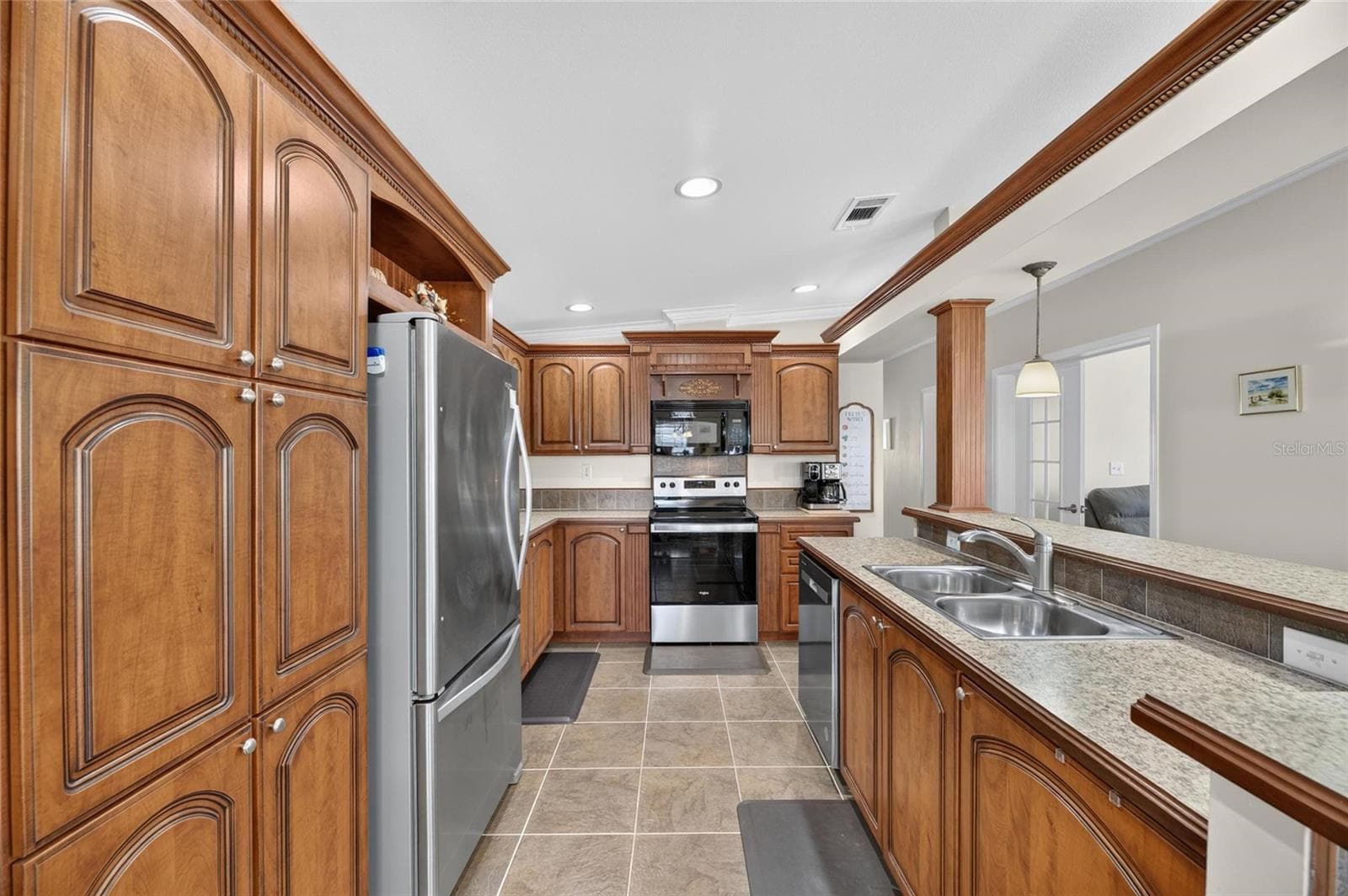 cabinets galore, plenty of space to hide your fave snacks - 10054 COLLINGWOOD AVE, DADE CITY
