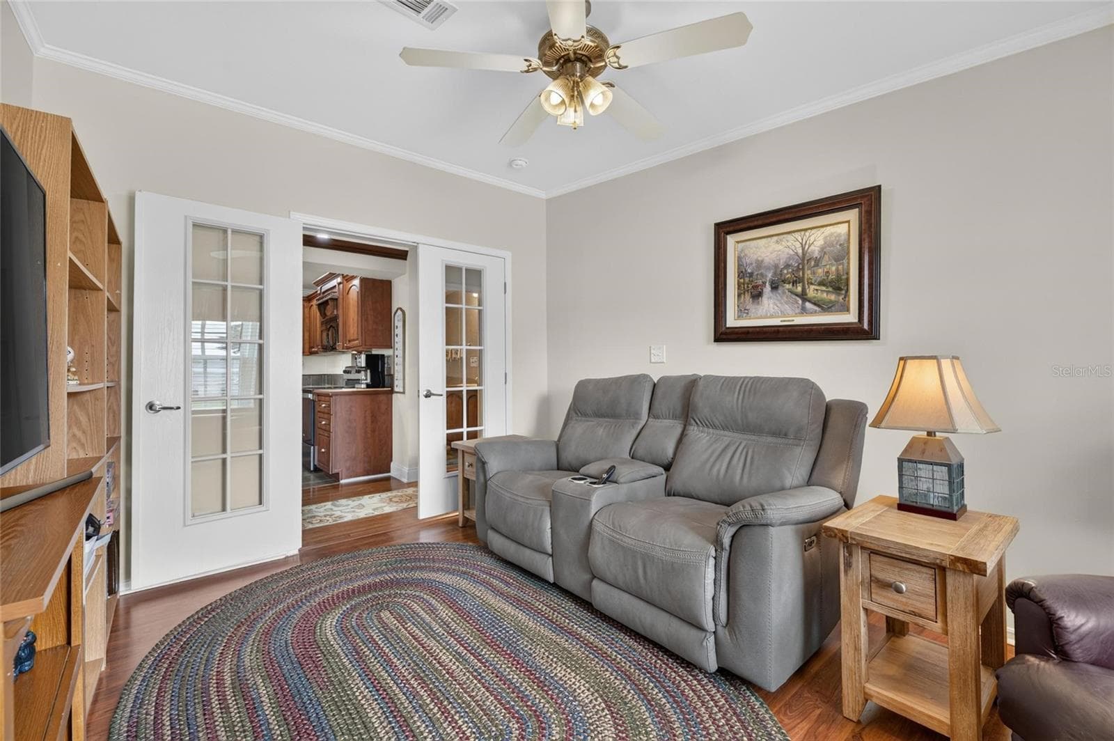 french doors into the den/study/tv room - 10054 COLLINGWOOD AVE, DADE CITY