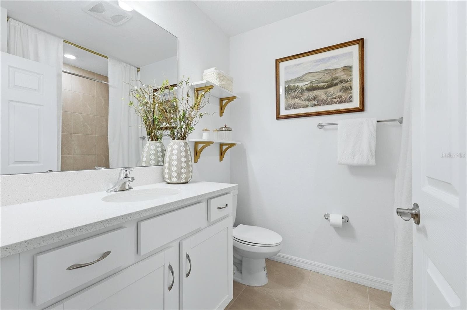 Guest bathroom with shower and tub - 7392 CABIN LN, SARASOTA