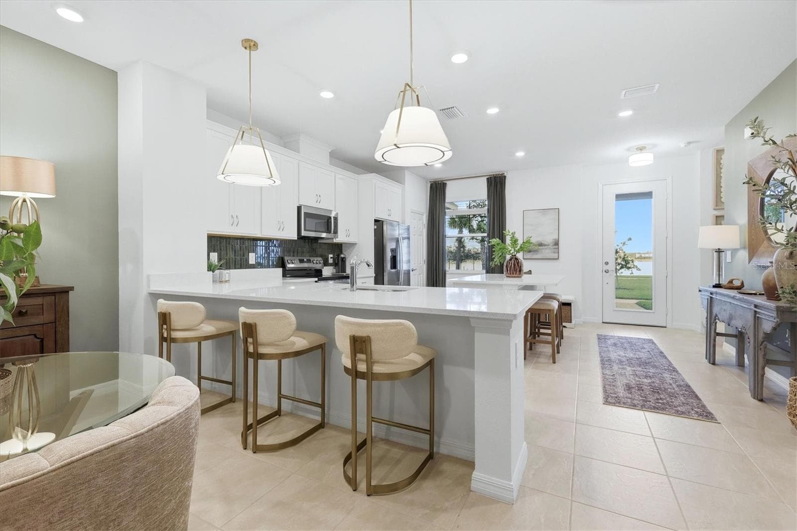Breakfast bar seating - 7392 CABIN LN, SARASOTA