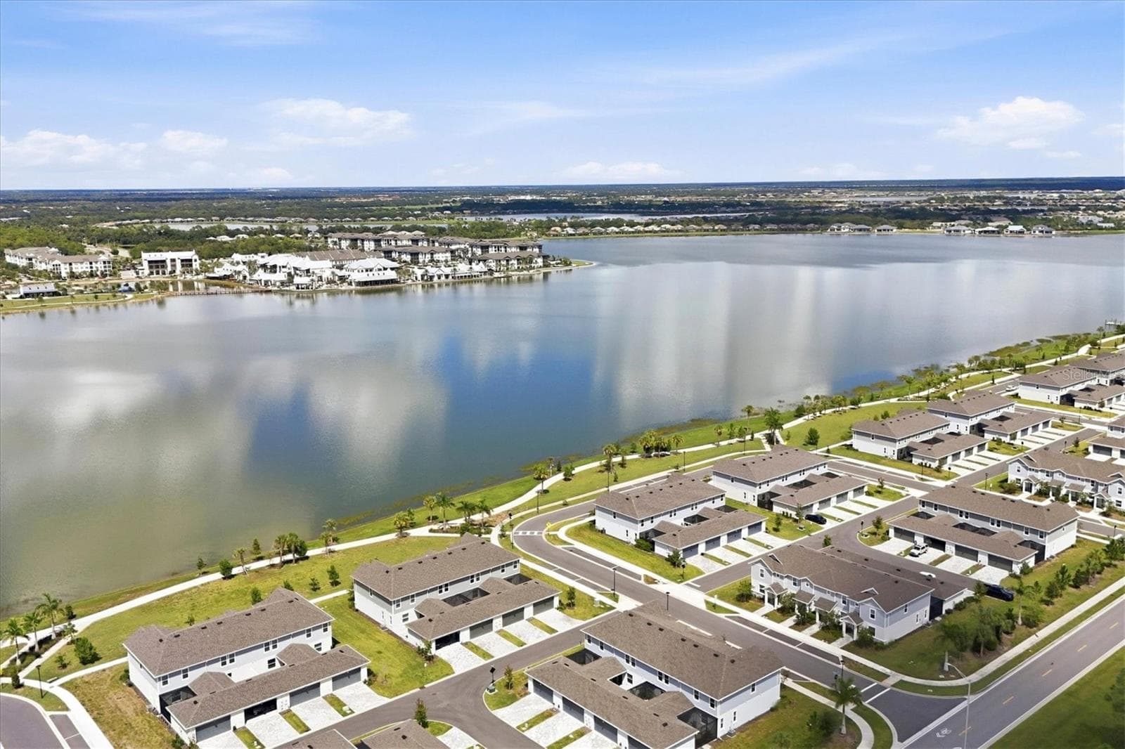 View of Waterside Place across the lake - 7392 CABIN LN, SARASOTA