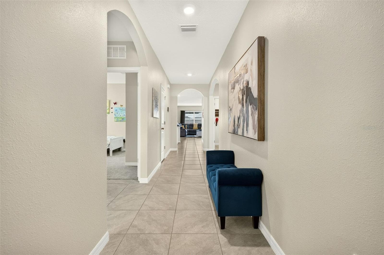 Spacious entry way with 2 bedrooms and a full bath to the front of the home - 17206 RESERVA DR, BRADENTON