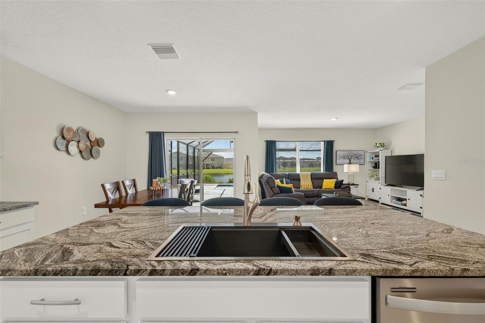 Abundant courter space and work space; large center island with drop-in farm sink - 17206 RESERVA DR, BRADENTON