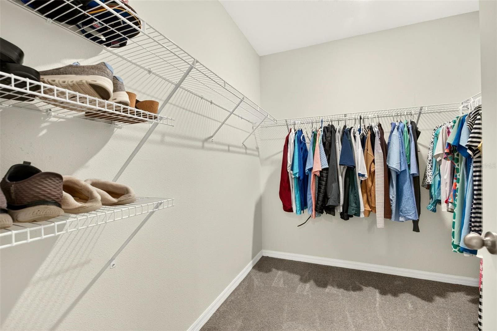 Primary walk-in closet - 17206 RESERVA DR, BRADENTON